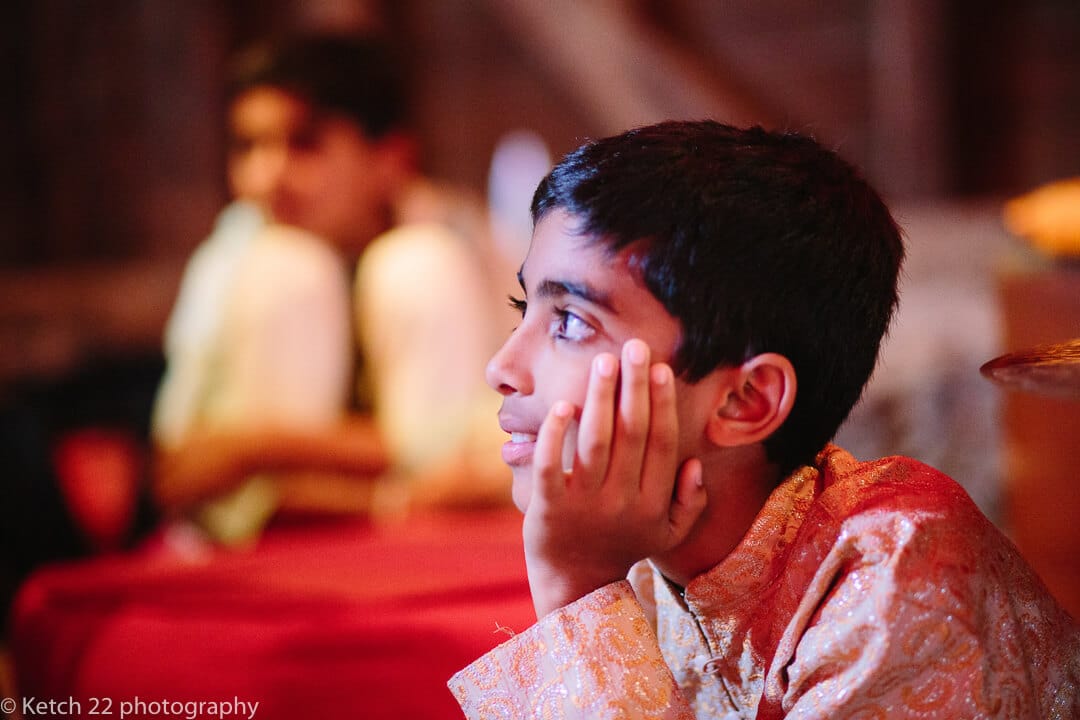 Young boy in Indian costume at Hindu henna night