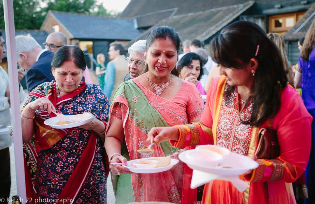 Wedding guests enjoying Indian food at Hindu Sangeet evening