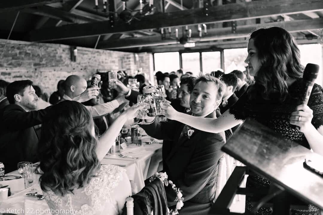 Wedding guests toasting at speechs in Herefordshire