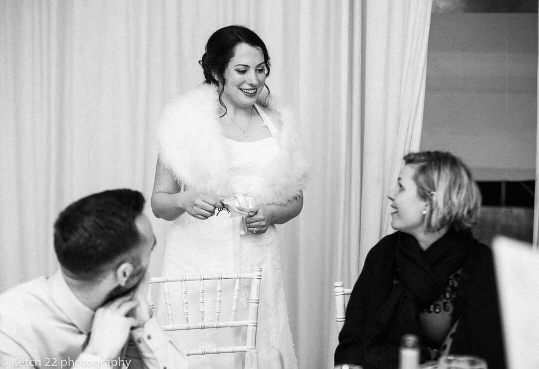 Bride chatting to wedding guests