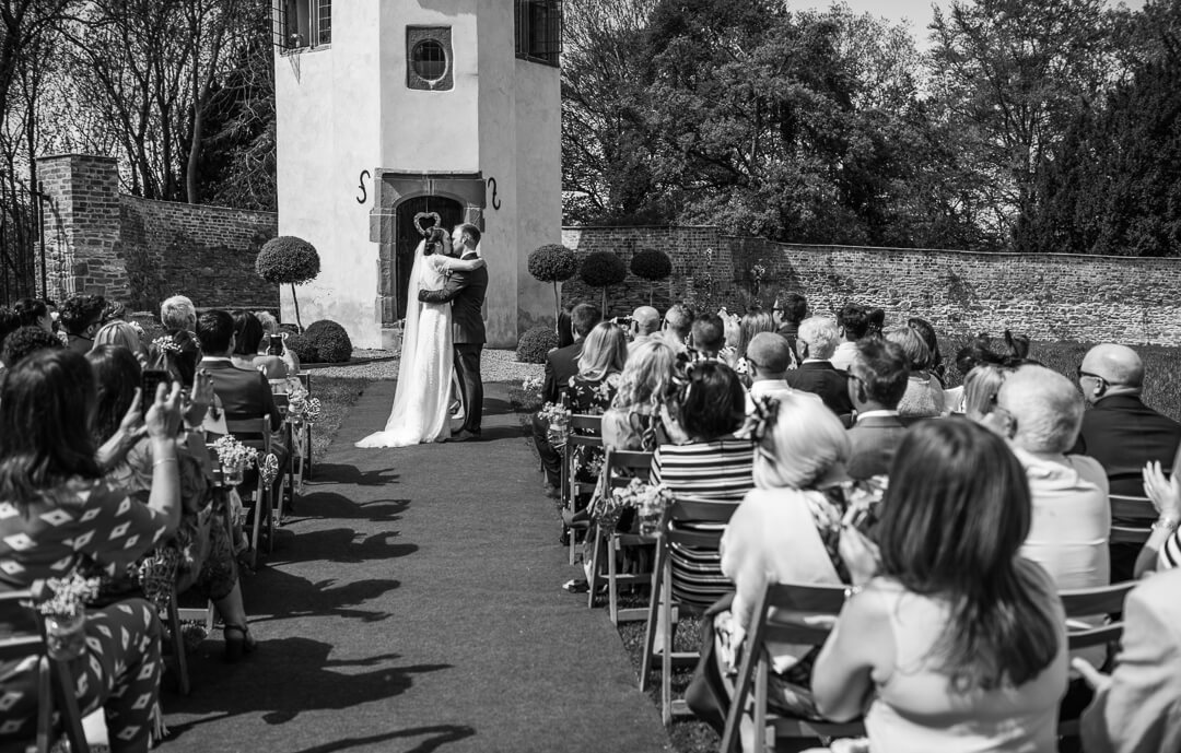 Black and white photo of wedding ceremony in Herefordshire