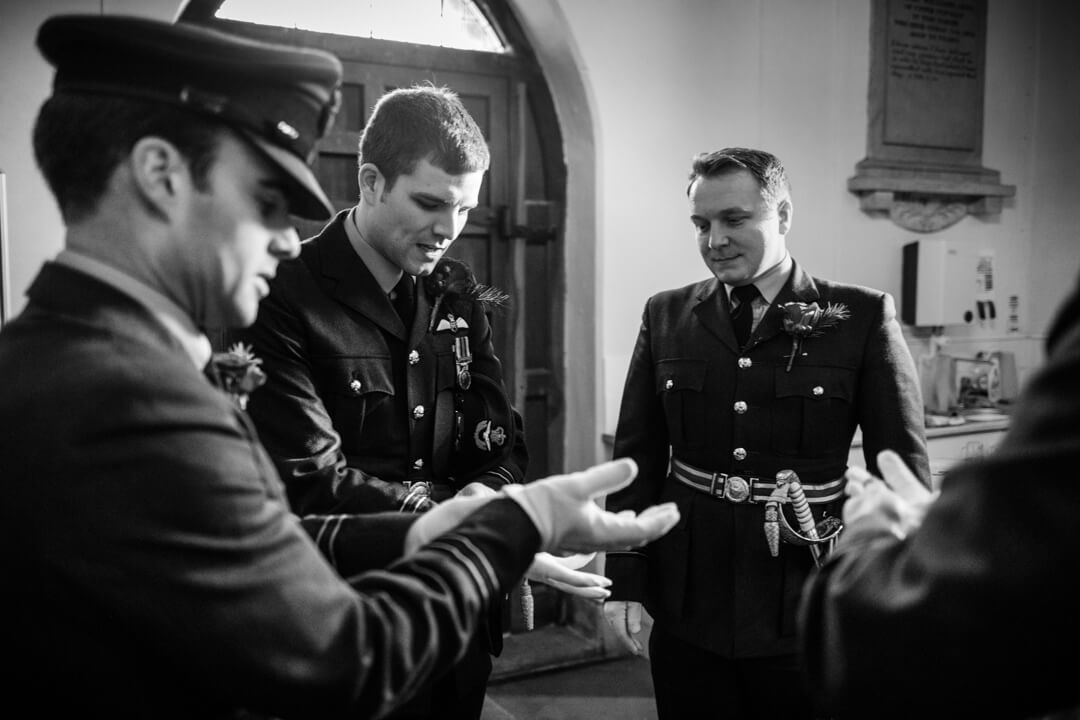 Groom and groomsmen in RAF uniform getting ready