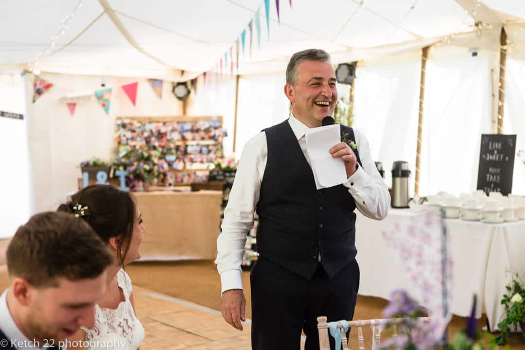 Father of bride speaking at wedding