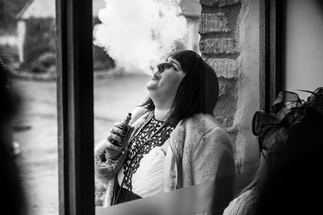 Wedding guest vaping in Gloucestershire