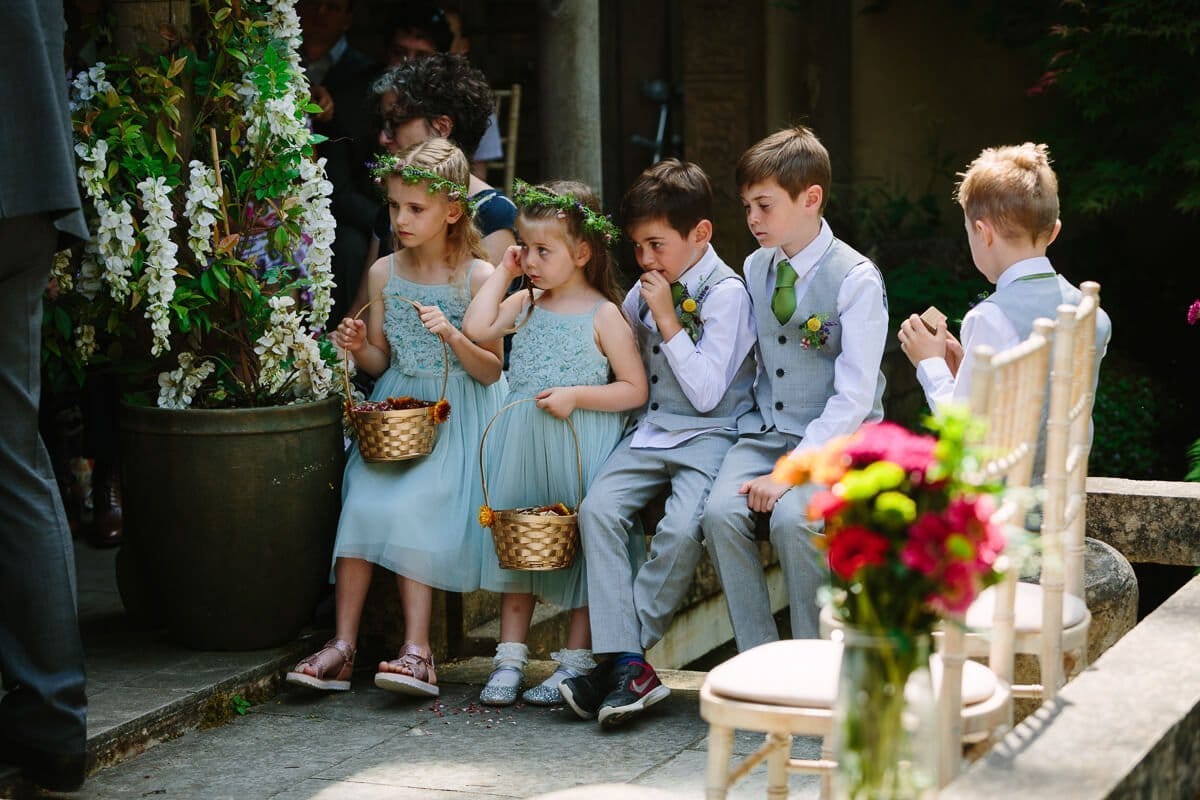 Page boys and flower girls at wedding ceremony