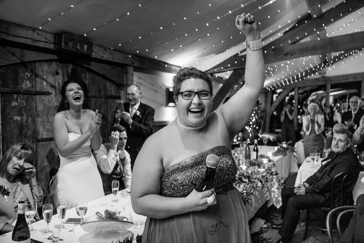 Brides sister thumps the air as she finishes speech