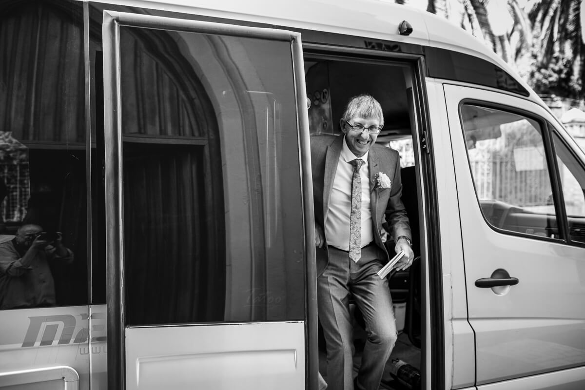 Father of bride arriving in mini bus to Wedding ceremony