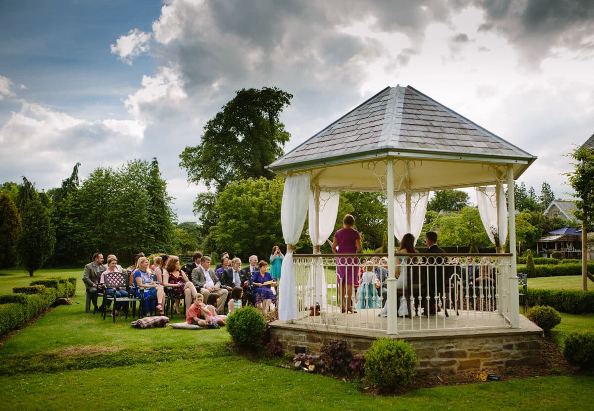 Outdoor garden ceremony wedding at Lemore Manor