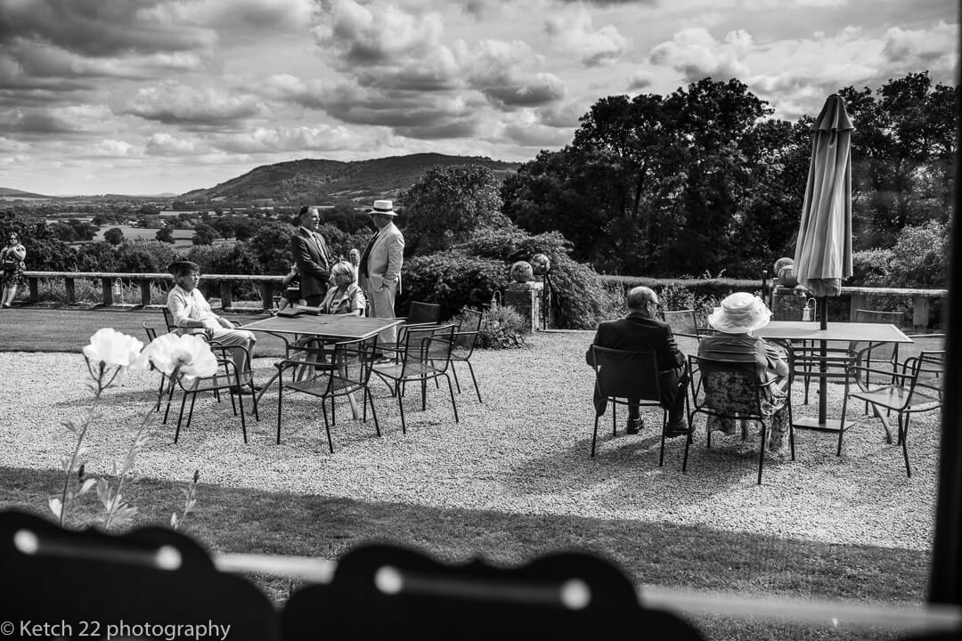 Whitney Court weddings overview of garden terrace with guests