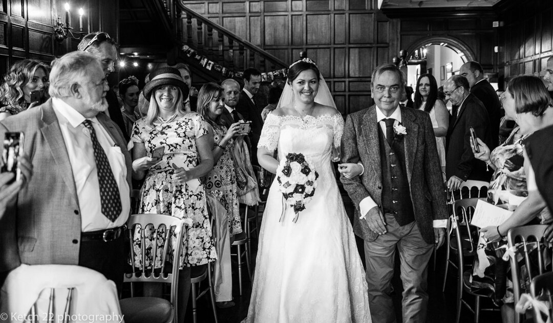 Bride and Father walking down aisle at Whitney Court wedding ceremony