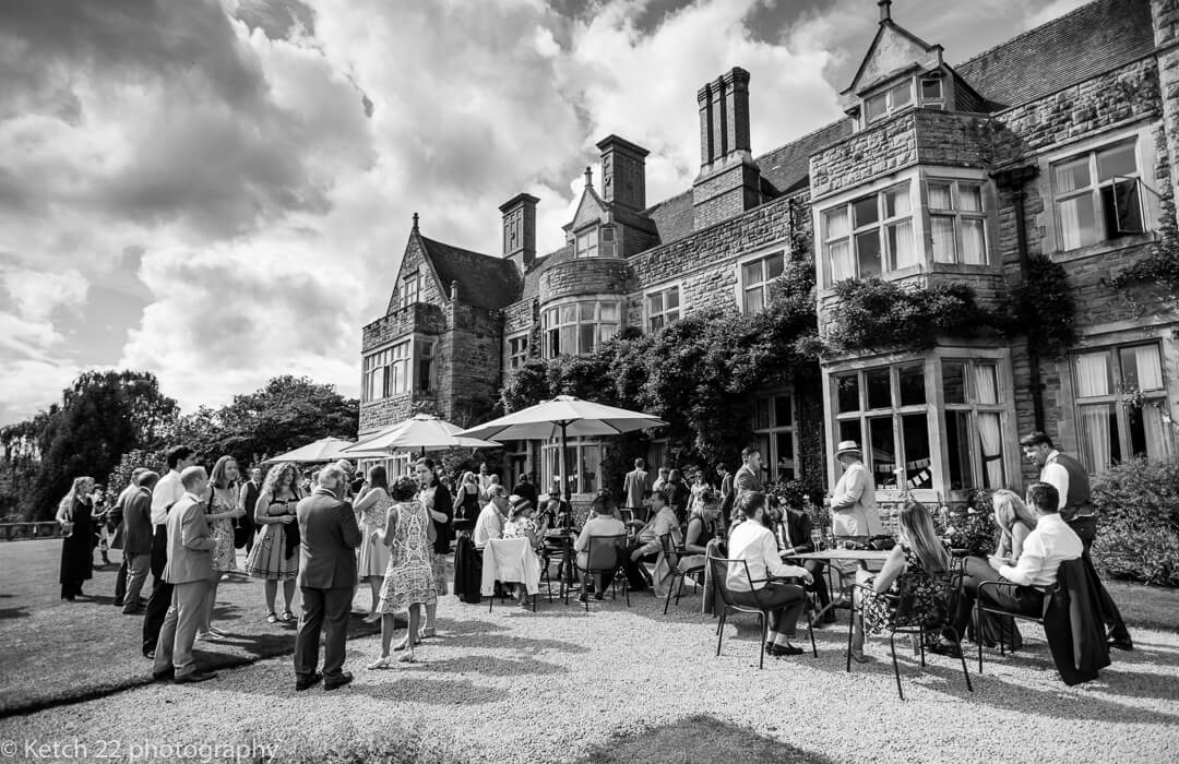 Whitney Court weddings with view of guests on garden terrace