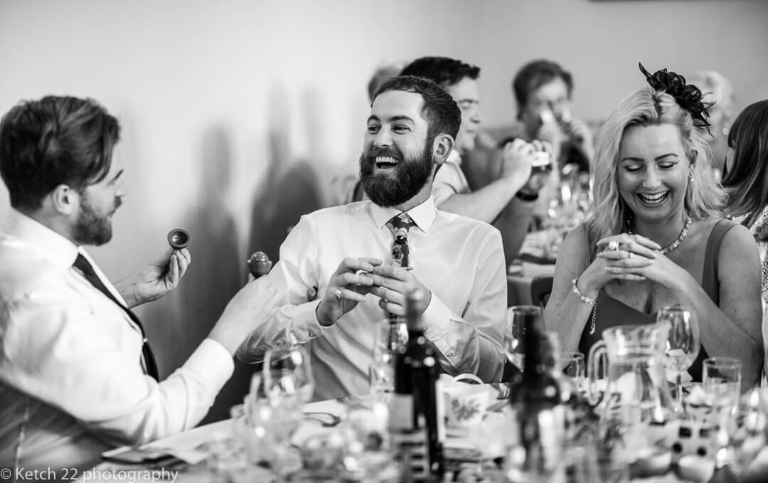 Wedding guest laughing at speeches at Whitney Court