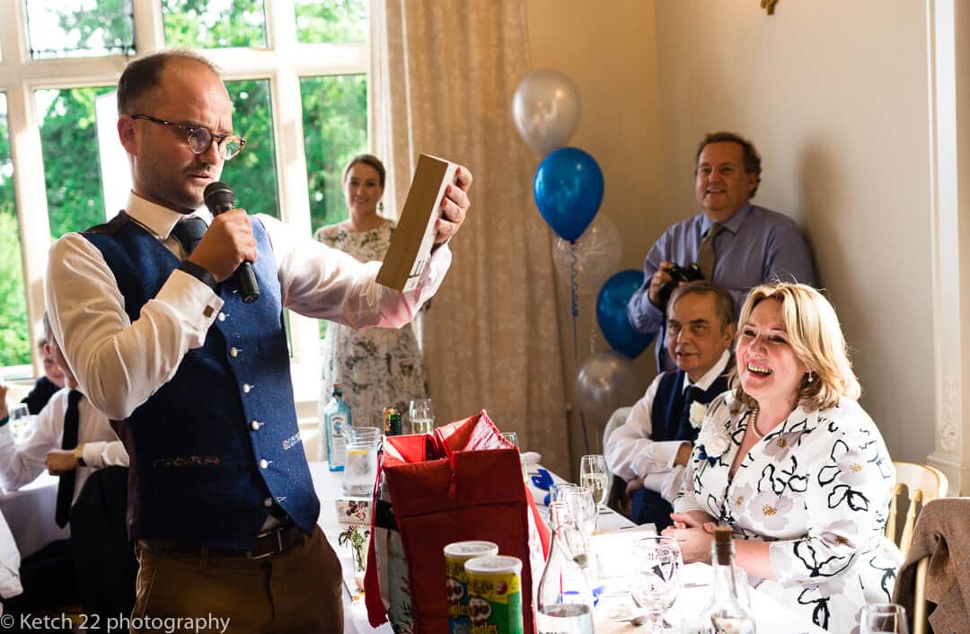 Best man making speech at reportage wedding