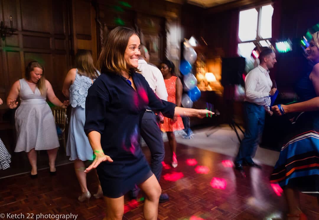 wedding guest dancing at reception