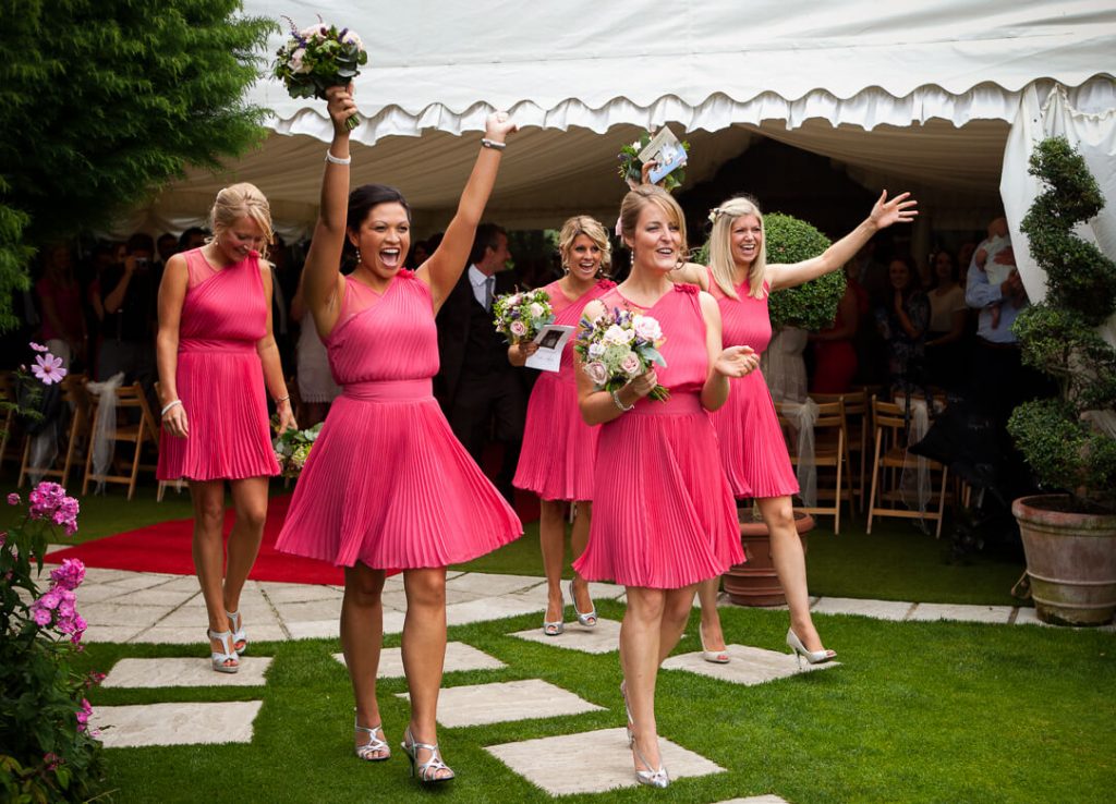 Bridesmaids in pink dresses at Cheltenham wedding
