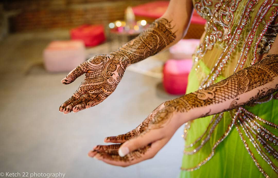 Hindu bride painted hands and arms at Indian Henna night