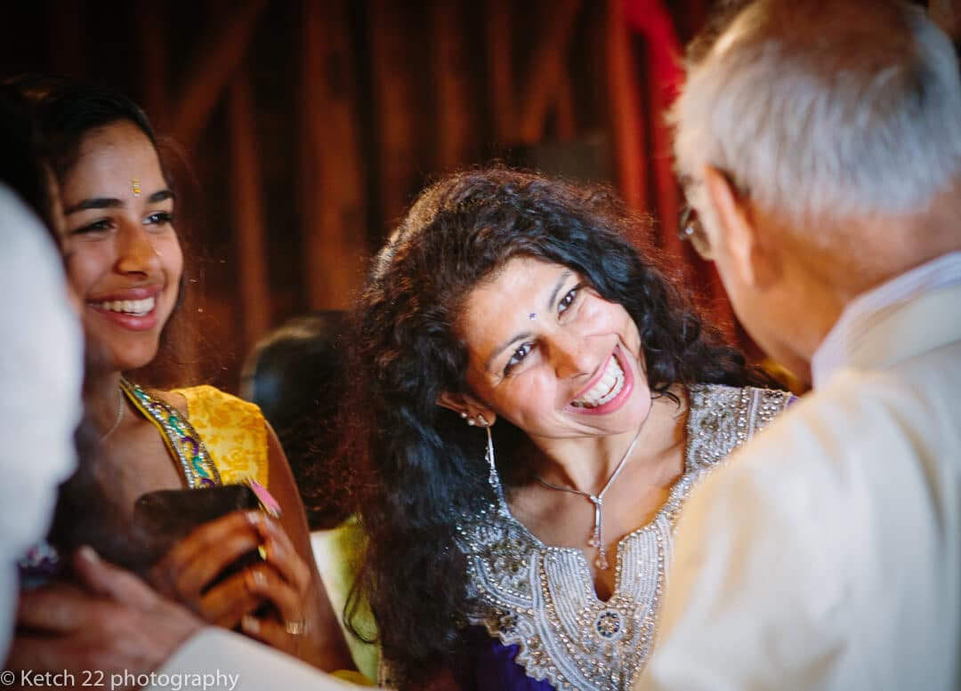Wedding guests greet each other at Indian Henna night