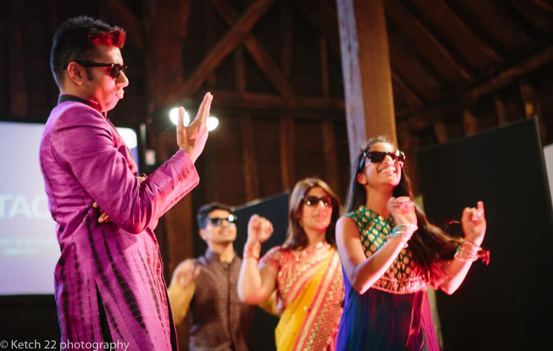 Colourful dancers performing at mehendi and sangeet evening