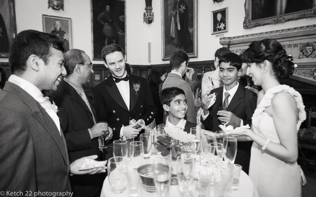 Wedding guests chatting at civil wedding ceremony in London