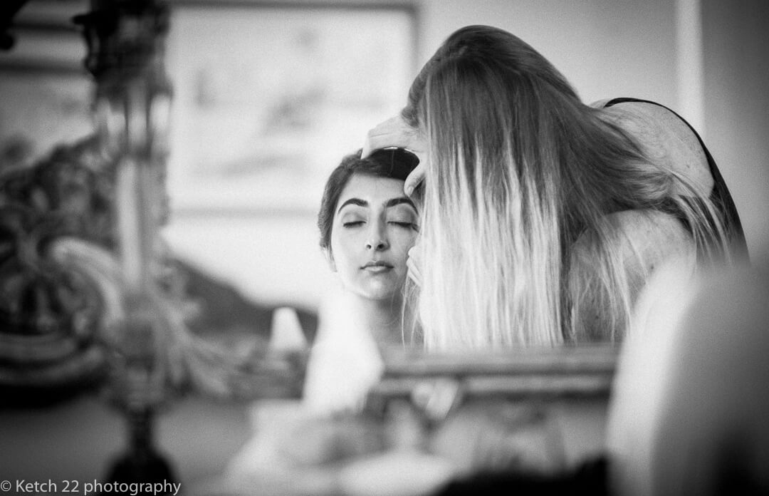 Indian bride getting ready for wedding at Highclere castle