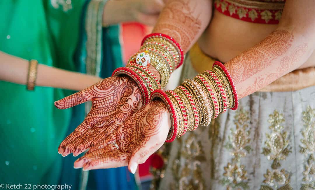 Beautiful henna painted hands of Indian bride