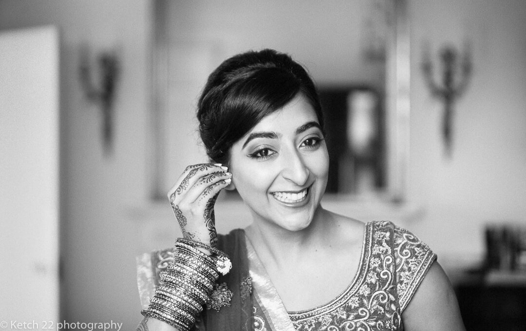 Black and white portrait of bride during preparations