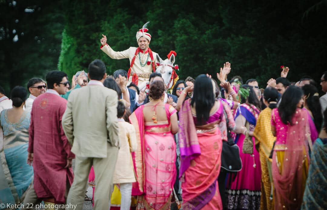 Hindu groom on horse back at Highclere castle 