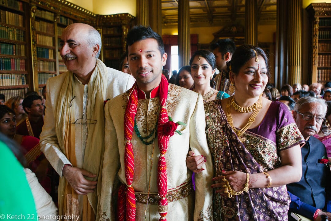 Groom and parents enter Hindu ceremony 