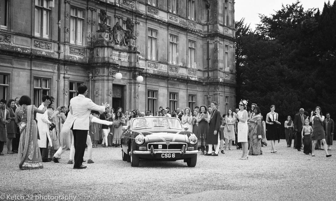 Wedding car leaving Highclere Castle