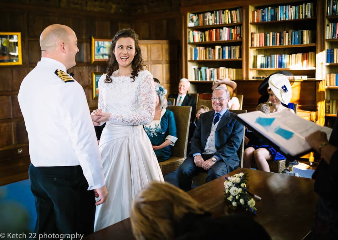 Bride and groom exchanging vows at Country house wedding