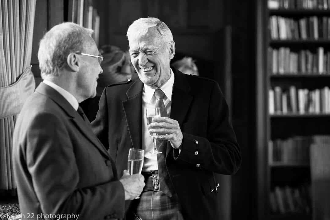 Wedding guests chatting at reception