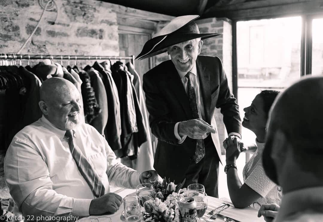 Grandad wearing silly hat at wedding