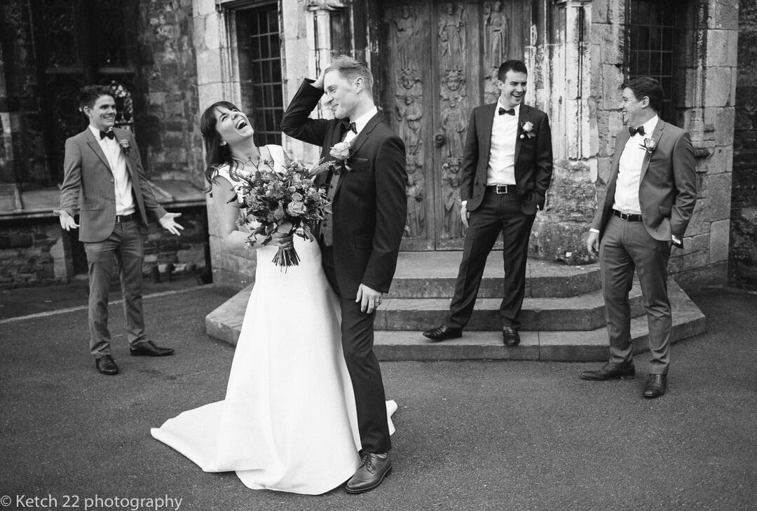 Funny reportage photo of bride and groom at Castle wedding