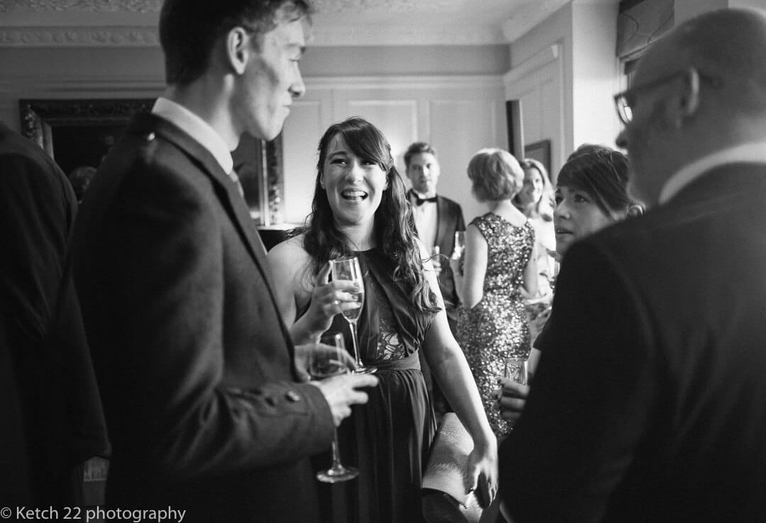 Wedding guests chatting at Foxhall Manor