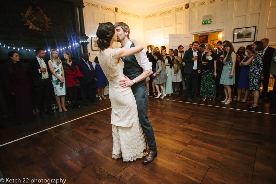 Bride and groom kissing at first dance at Homme House wedding
