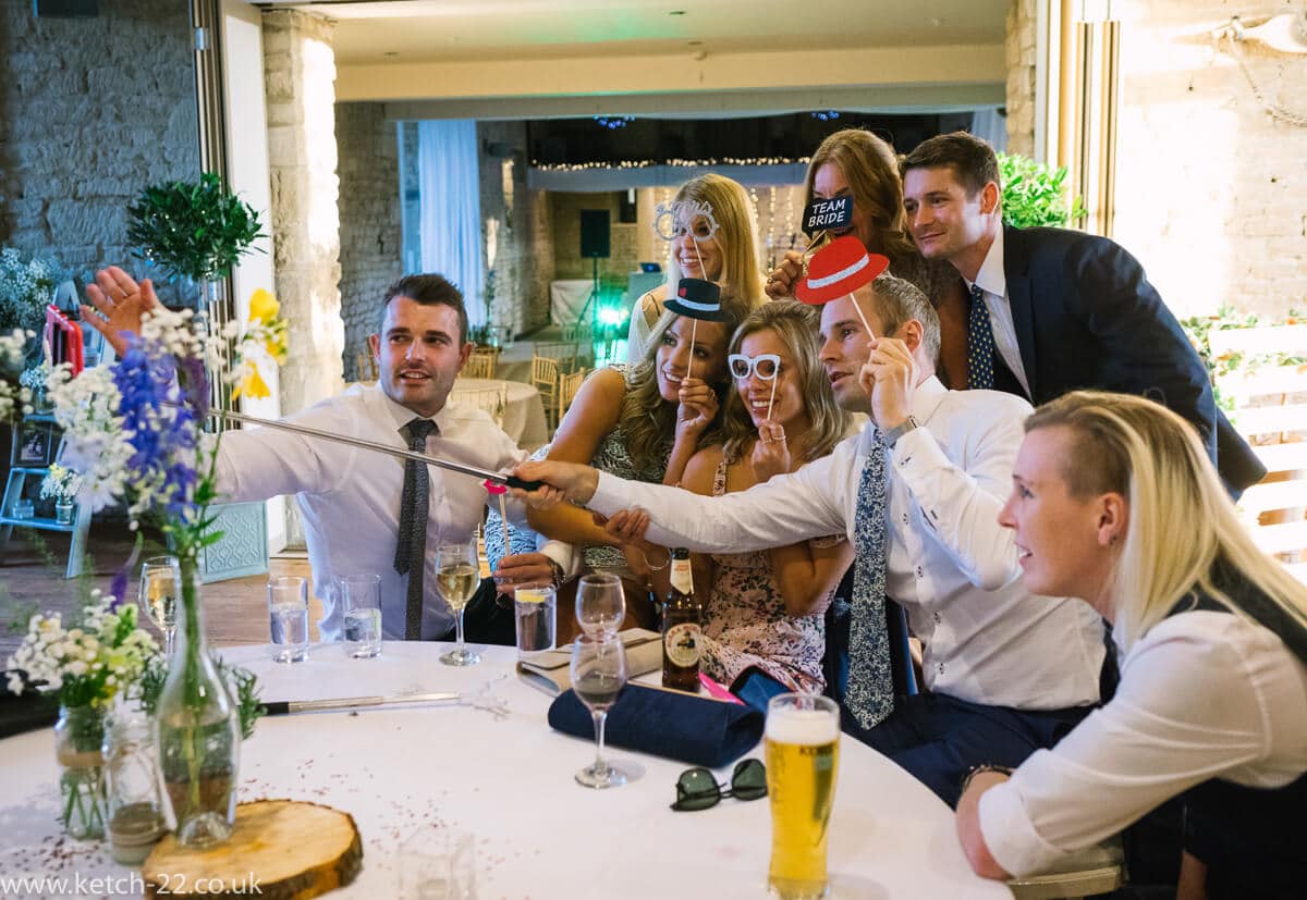 Wedding guests taking selfie