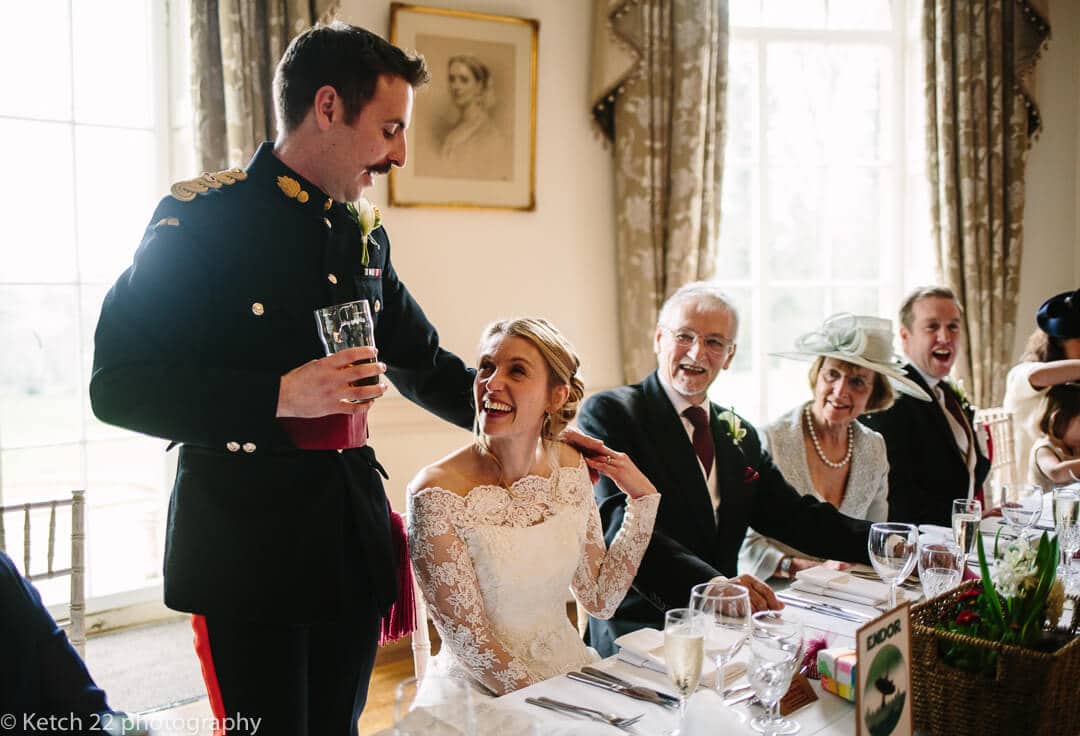 Groom making speech at country house wedding