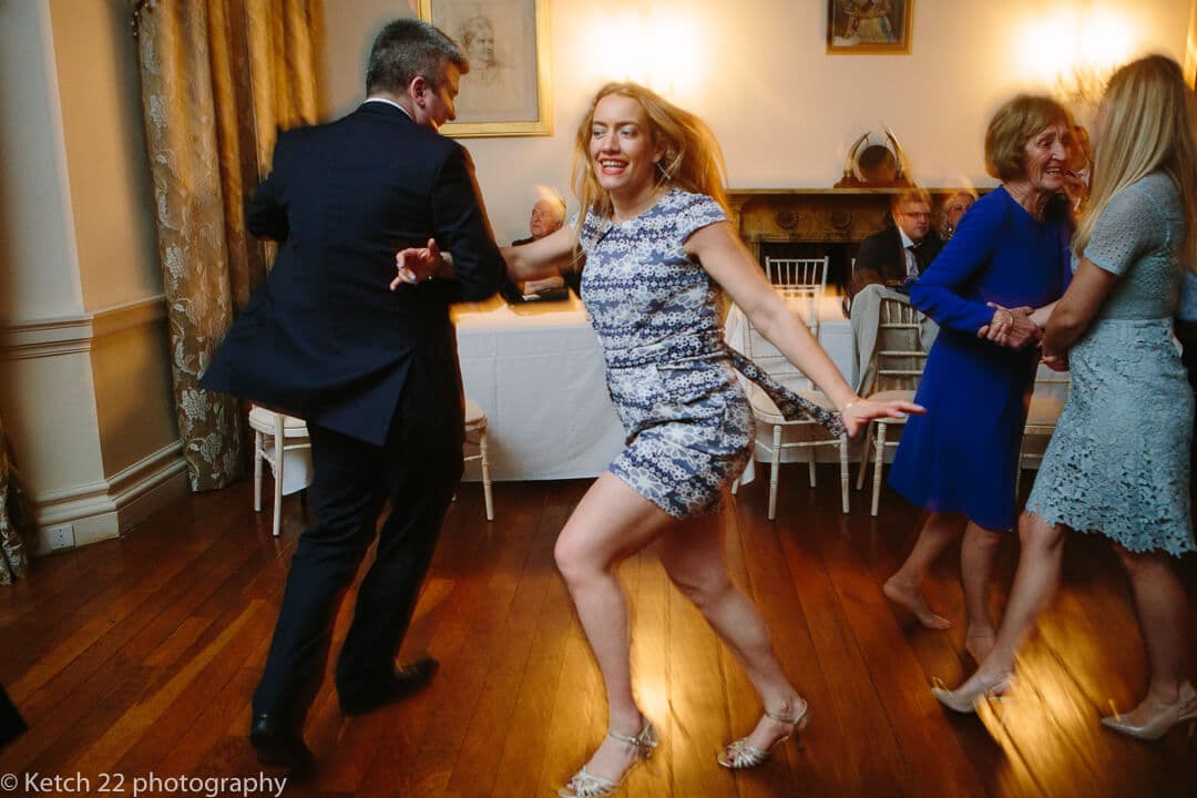 Wedding guest dancing at reception