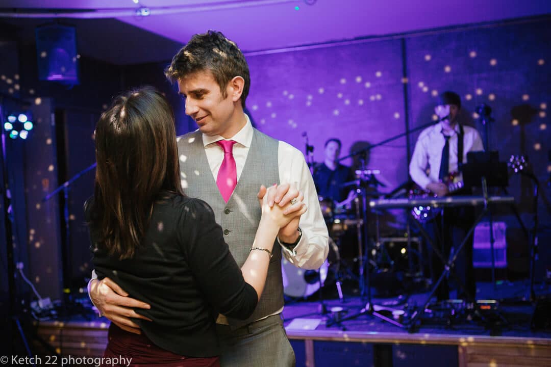 Wedding guests slow dancing at wedding