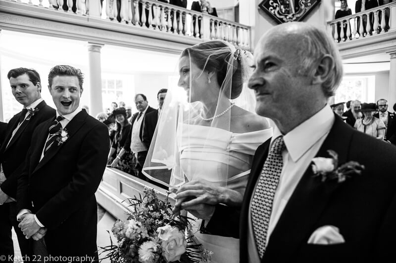 Groom takes first look at Bride at Dorset summer wedding
