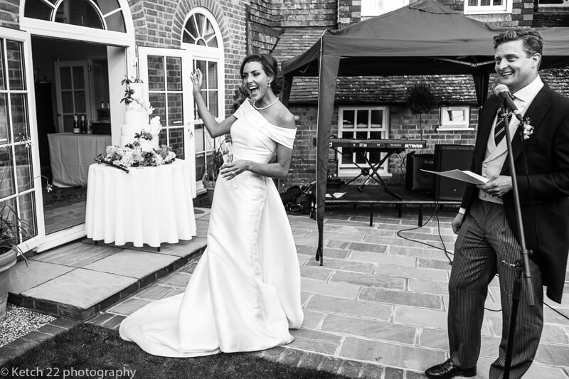 Bride and groom making speech at Dorset summer wedding