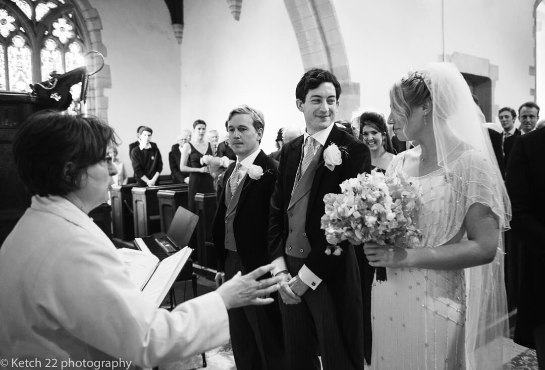 Groom looking at bride for the first time during wedding ceremony