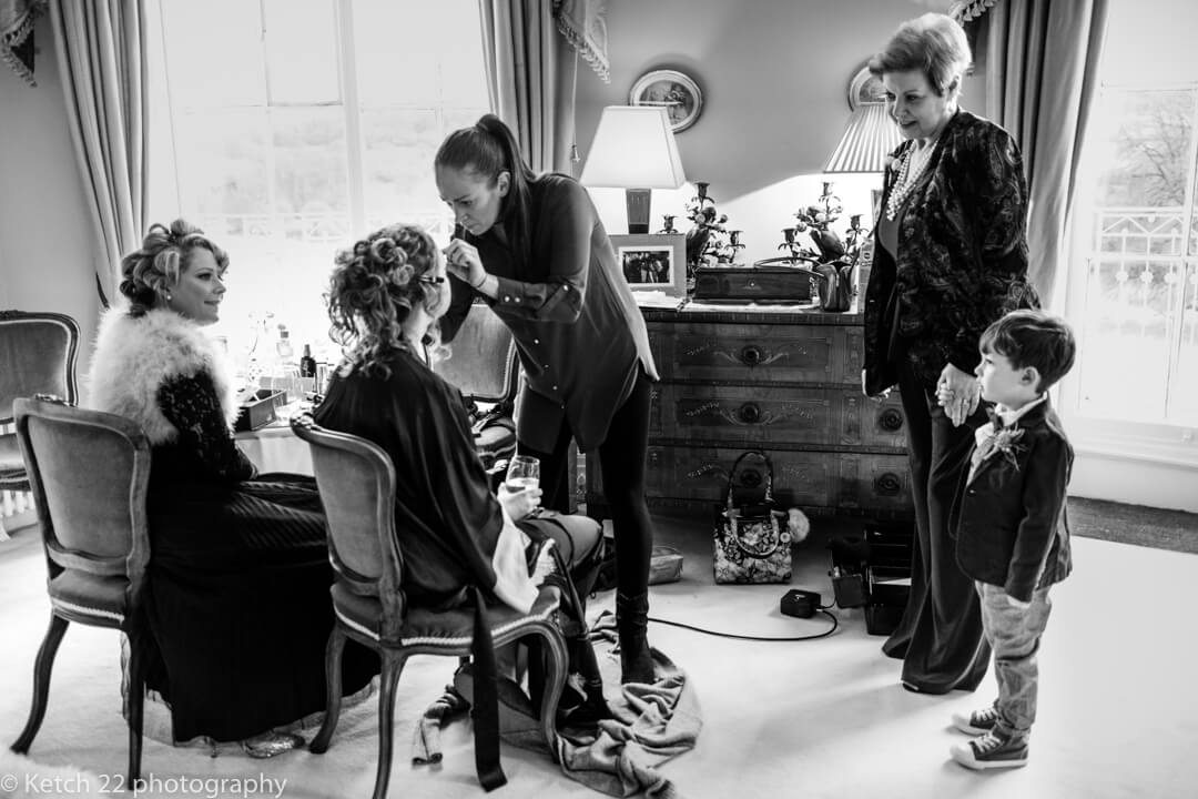 Candid wedding photo of bride getting ready at Somerset wedding