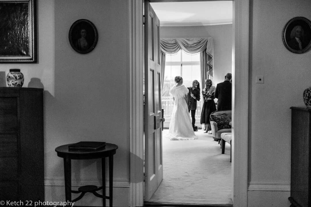 Bride making her final preparations just before the wedding ceremony