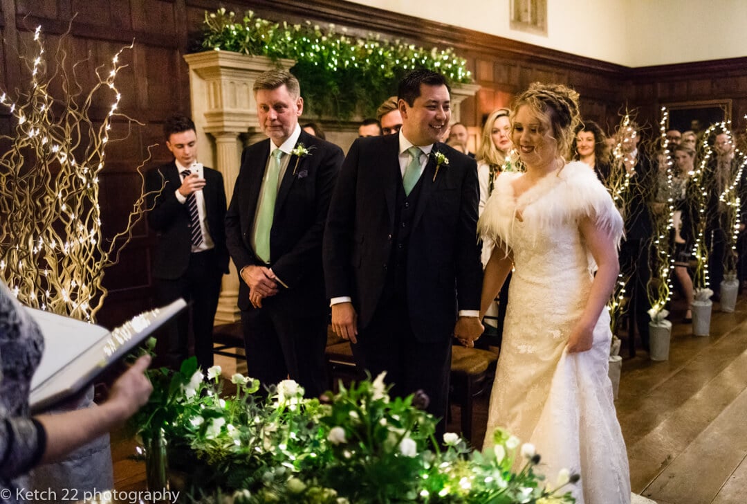 Groom looks at bride for the first time just before wedding ceremony