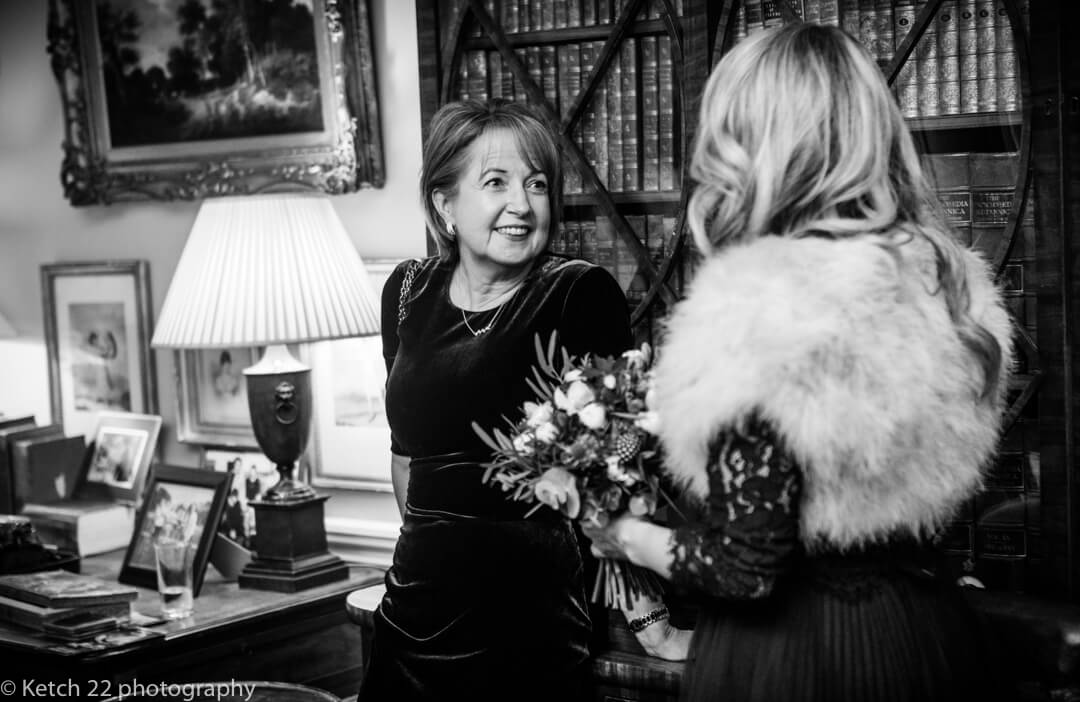 Wedding guest chatting at reception