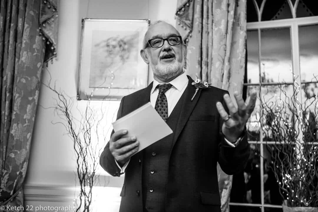 Reportage wedding photo of Father of bride making speech