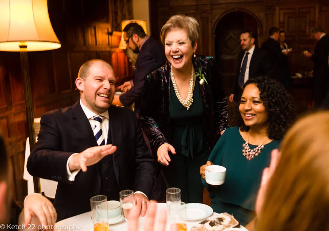 Mother of bride entertaining wedding guests at North Cadbury Court