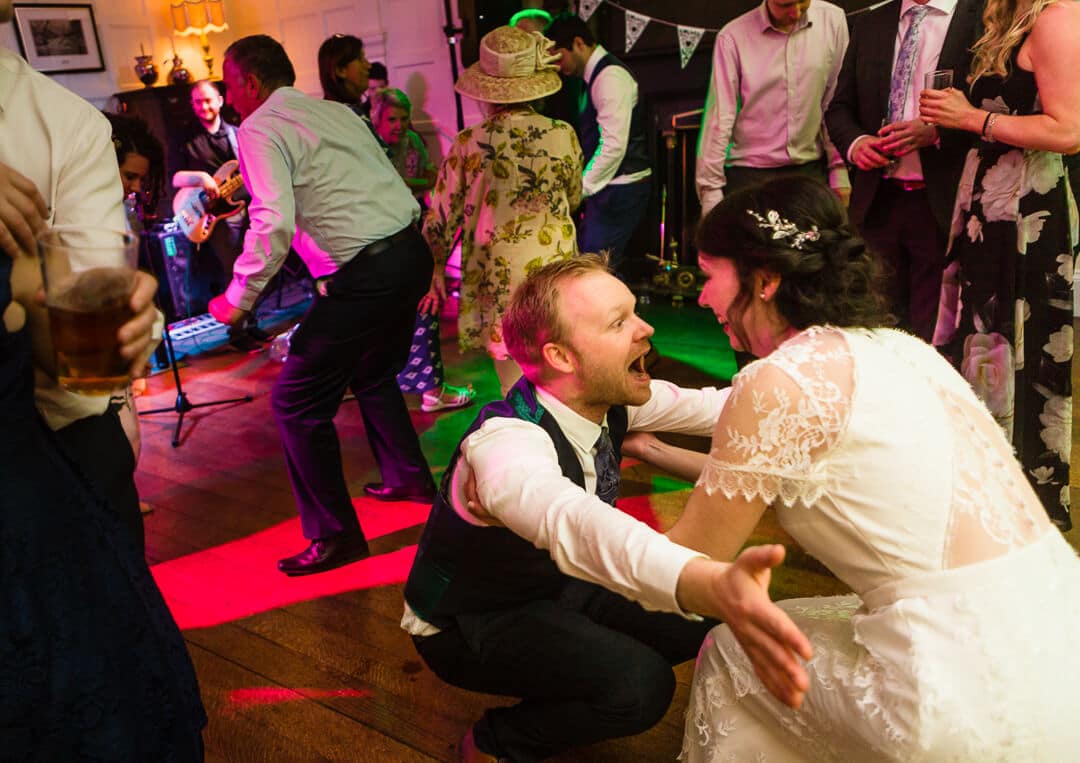 Bride and groom dancing at Homme House wedding reception