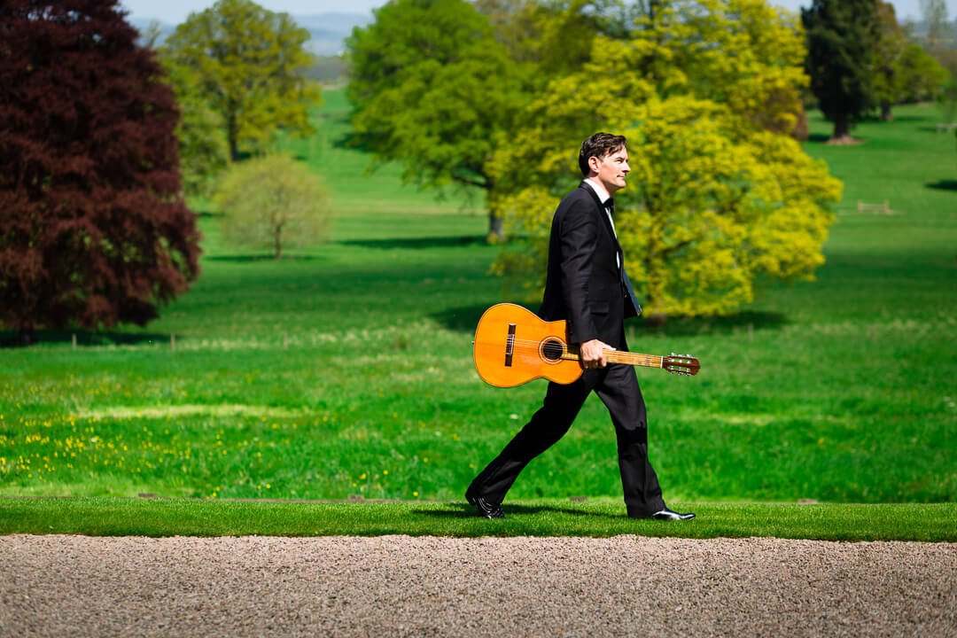 Musician with guitar at Homme House wedding